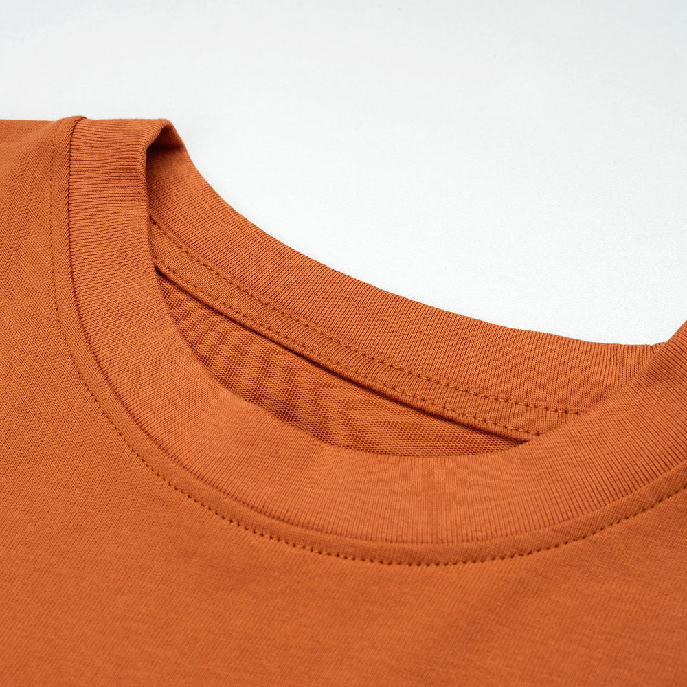 Chocobi Broad Tee – Rust Orange